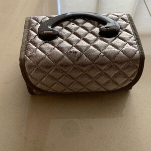 Sondra Roberts SR Sqaured metallic gold makeup case. Good condition.